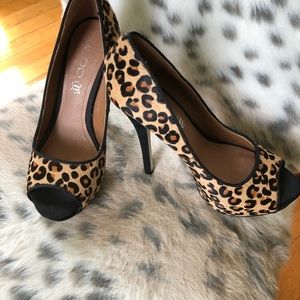 Leopard print Aldo shoes.